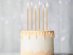 Tall birthday cake candles in light gold metallic color