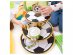 Cardboard cupcake stand with soccer ball design and gold edging