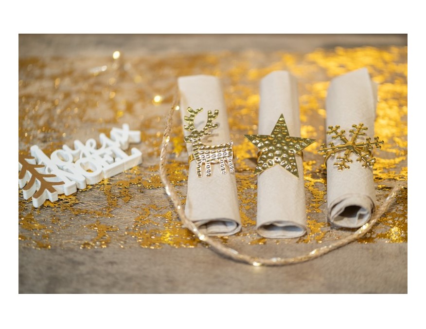Χρυσά μεταλλικά σφυρήλατα δαχτυλίδια για τις χαρτοπετσέτες για το εορταστικό σας τραπέζι